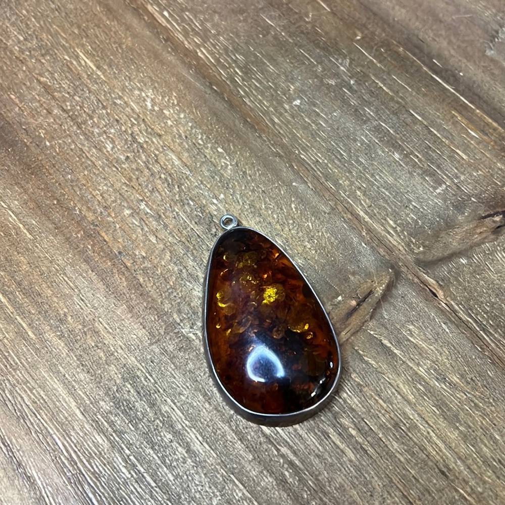 Large precious Amber pendant.